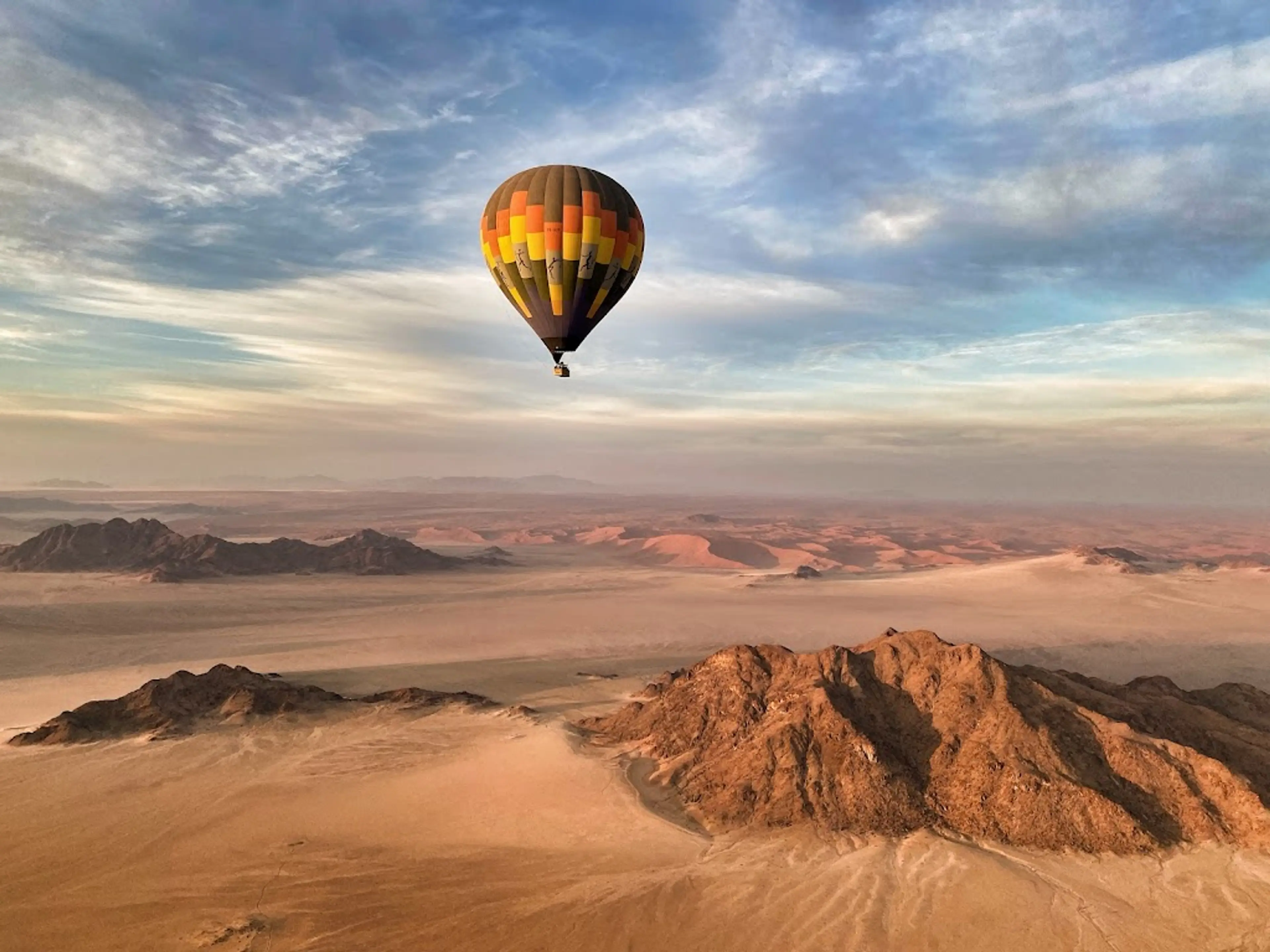 Sunrise hot air balloon ride over the Namib Desert