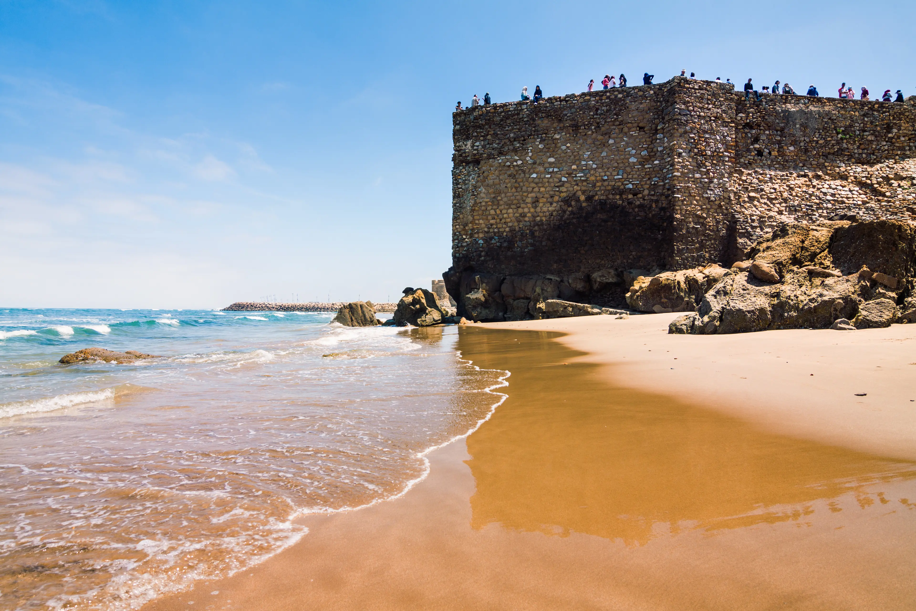 Asilah beach with part of the city walls