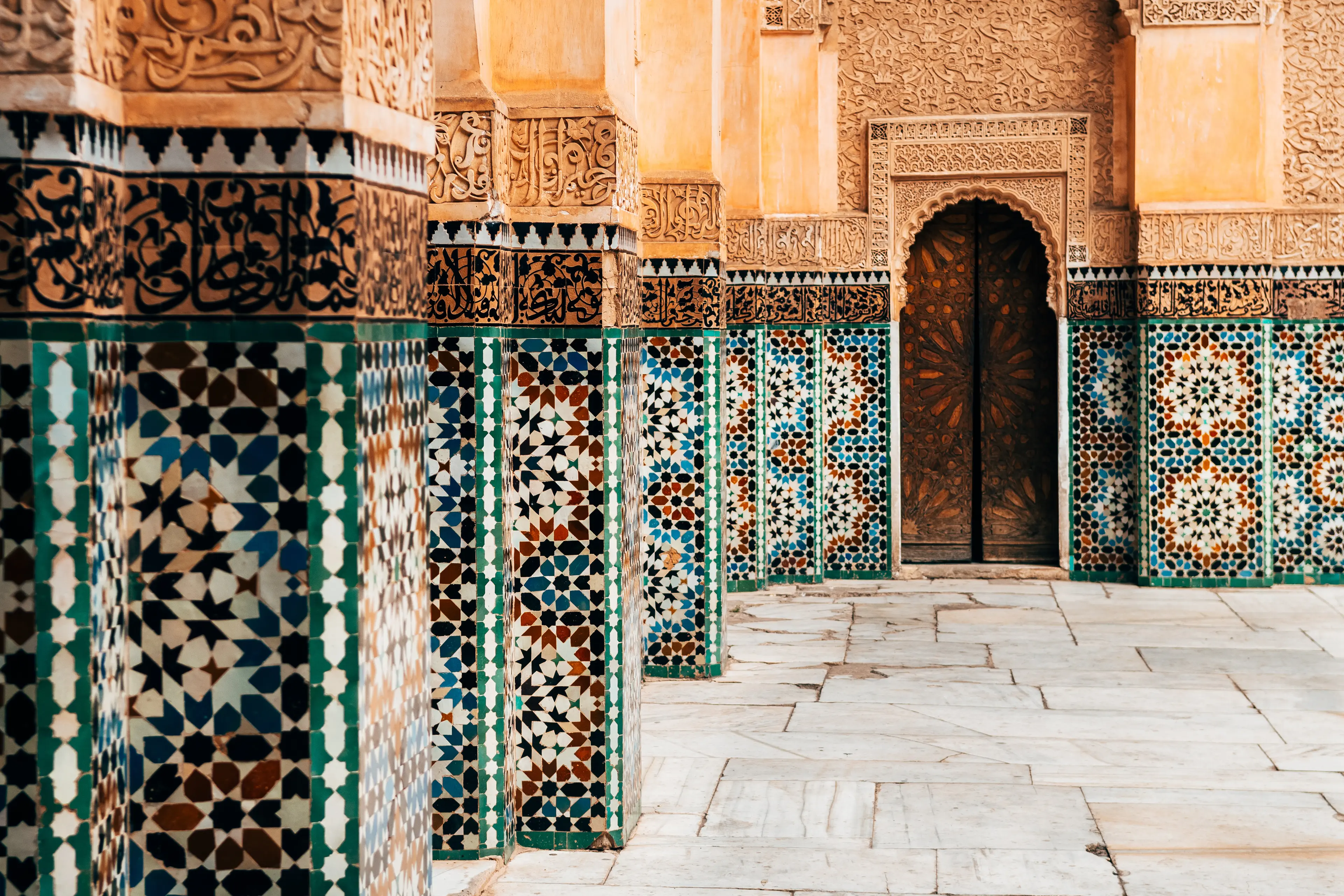 Colorful ornamental tiles at moroccan courtyard Colorful ornamental tiles at moroccan courtyard