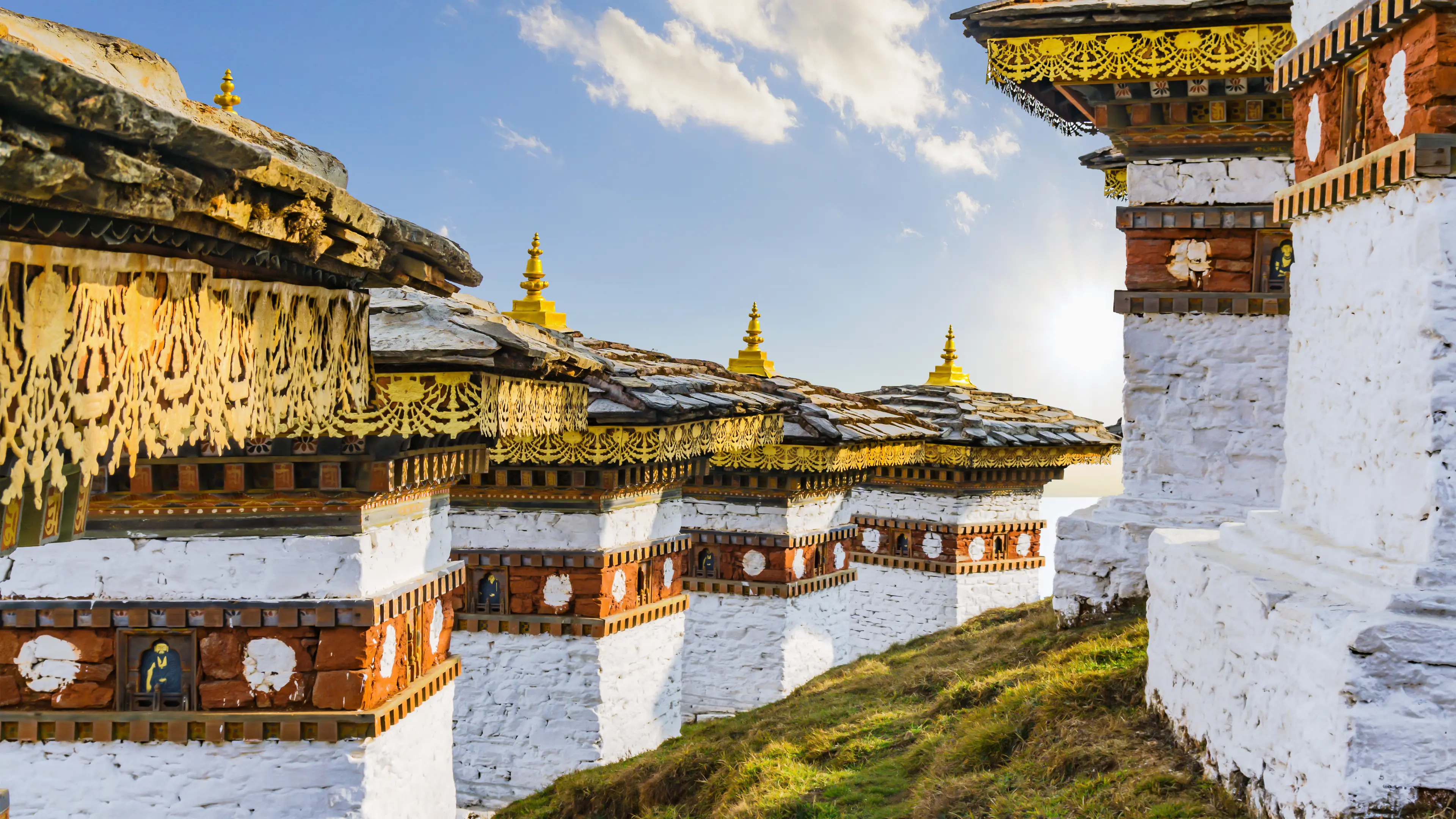View of the Dochula pass and some of its 108 stupa structures View of the Dochula pass and some of its 108 stupa structures