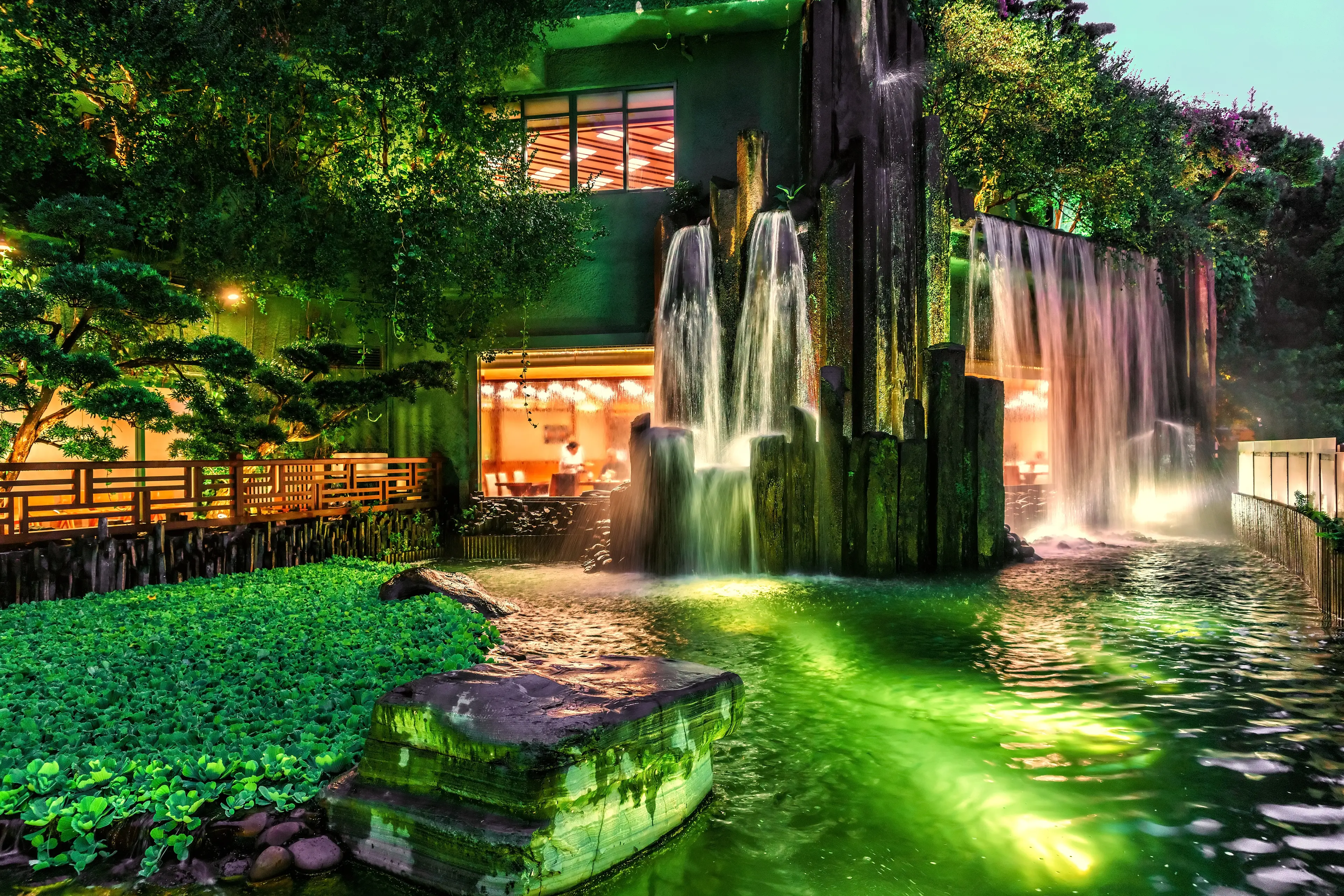 Cafe with waterfall and pond in Nan Lian Garden at Diamond Hill