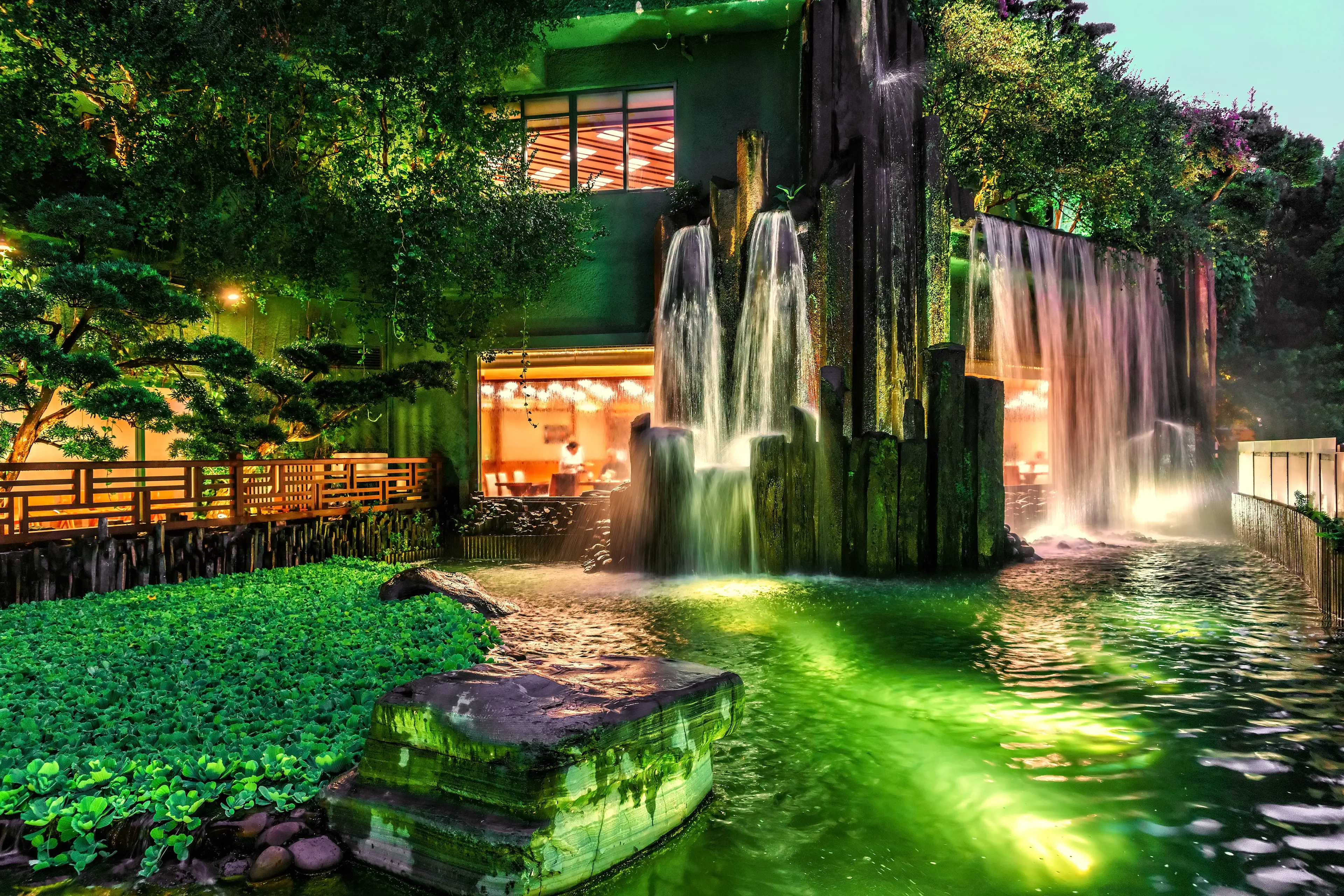 Cafe with waterfall and pond in Nan Lian Garden at Diamond Hill Cafe with waterfall and pond in Nan Lian Garden at Diamond Hill