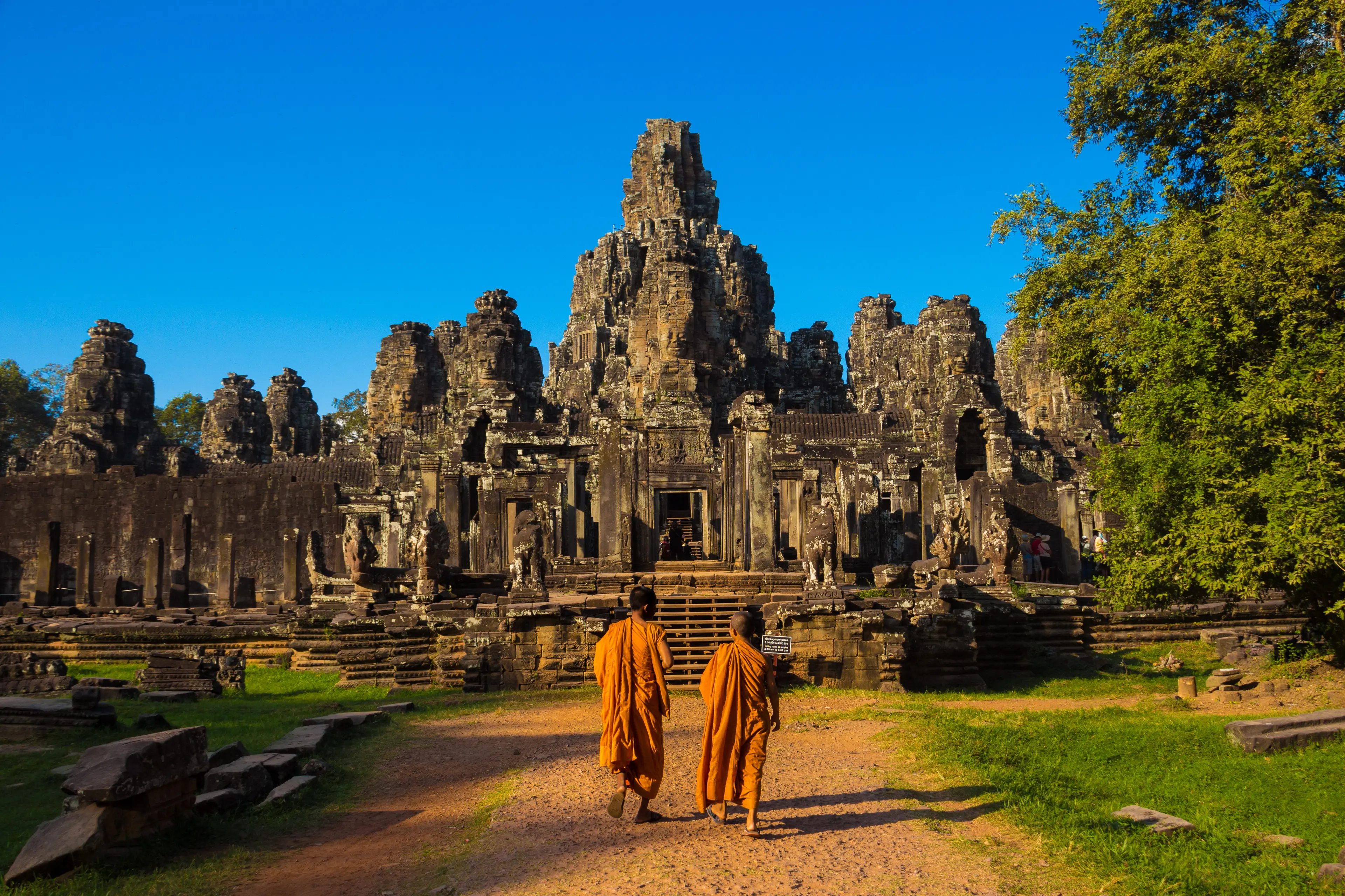The monks in the ancient stone faces of Bayon temple