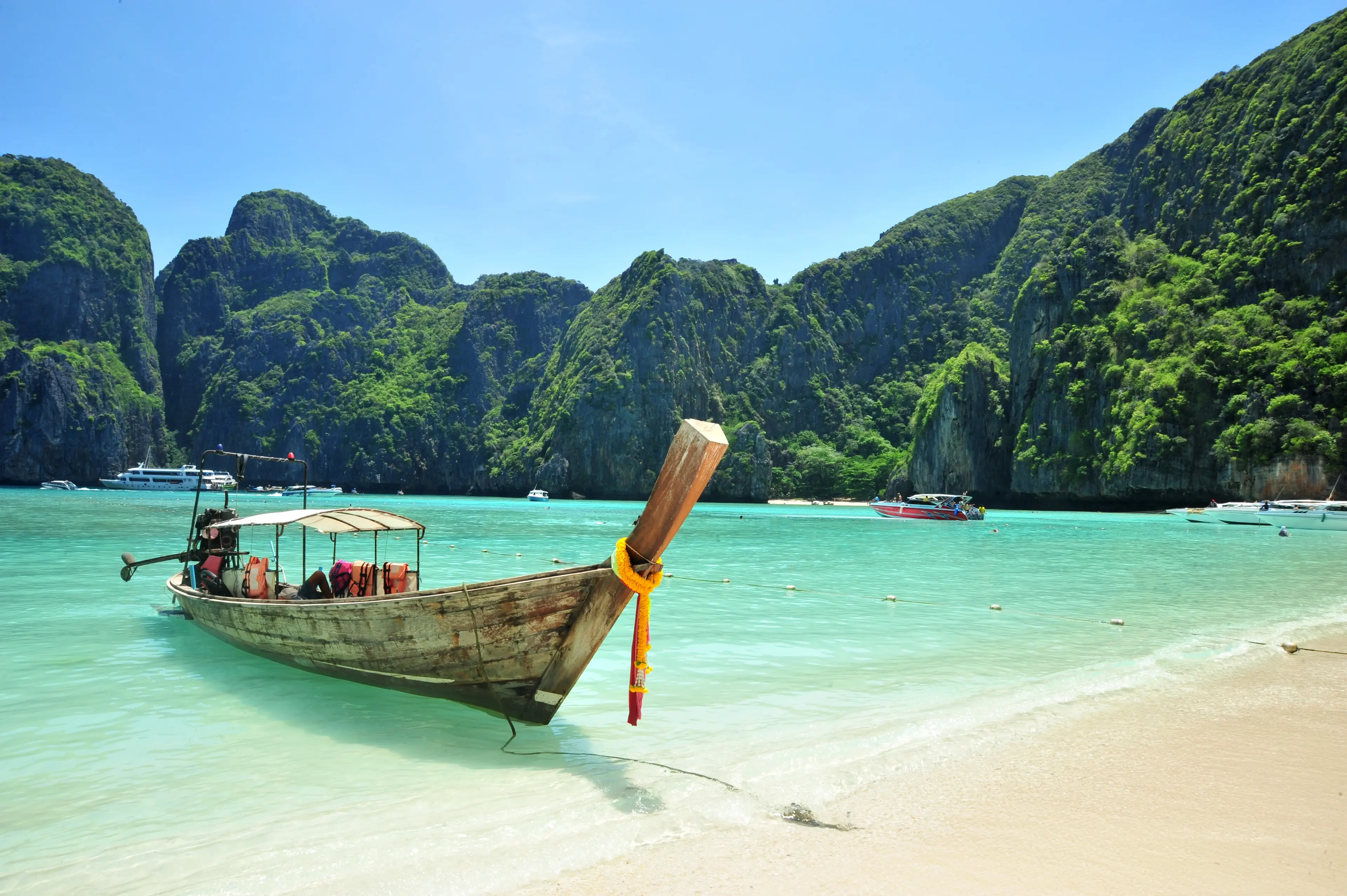 Traditional boat tied to the shore Traditional boat tied to the shore