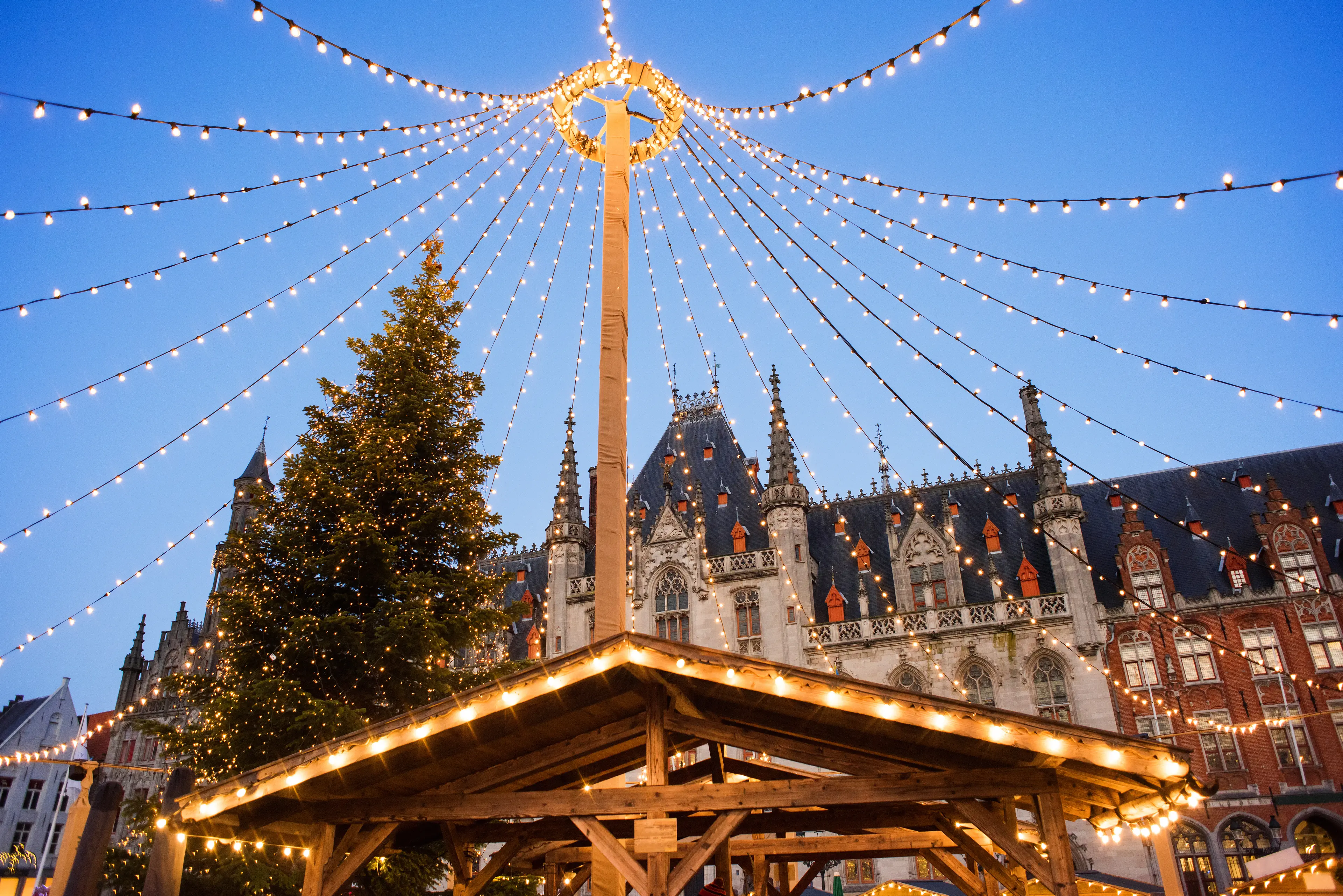 Main town square with decorated tree and lights