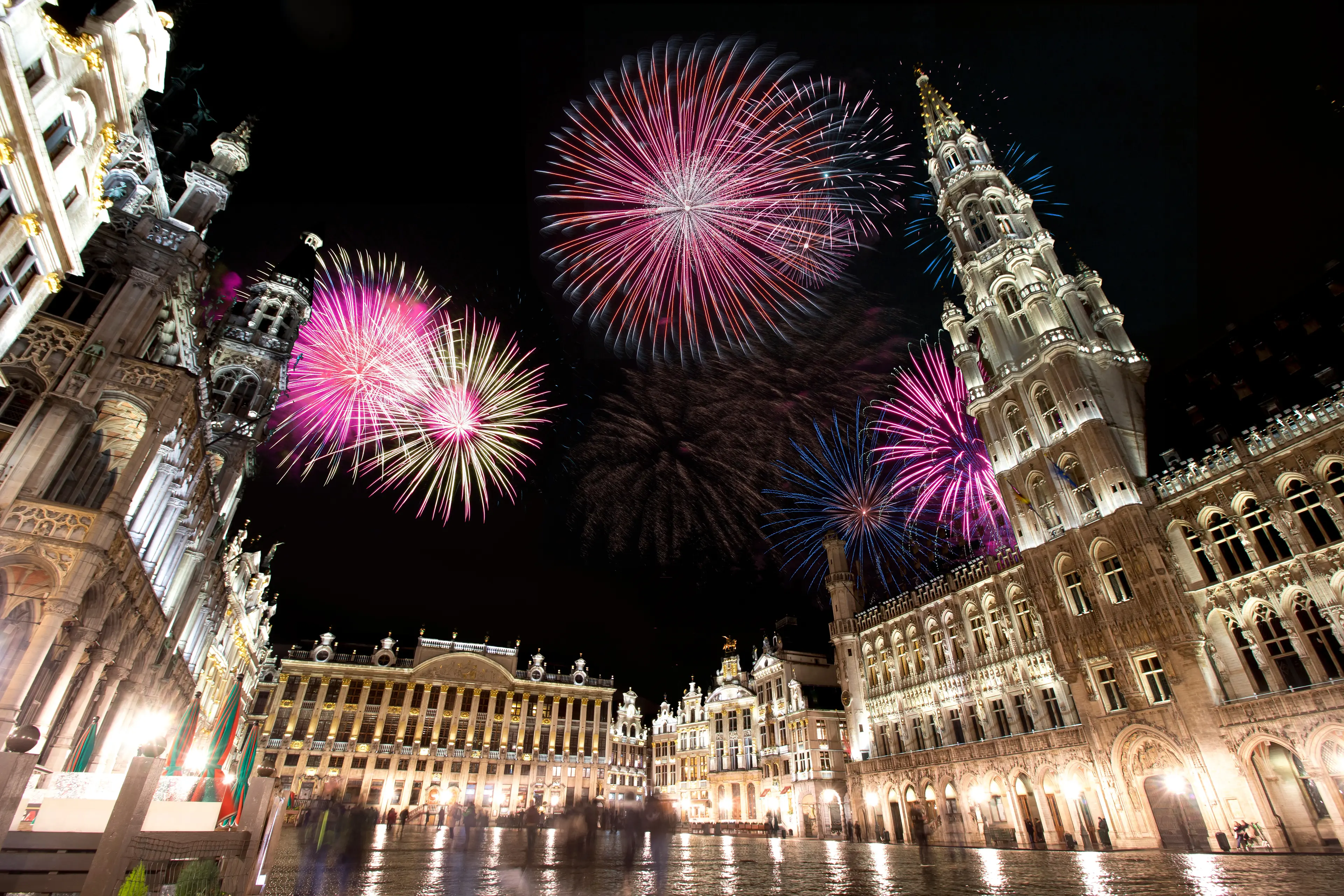 Celebratory fireworks for new year over Grand Place or Square