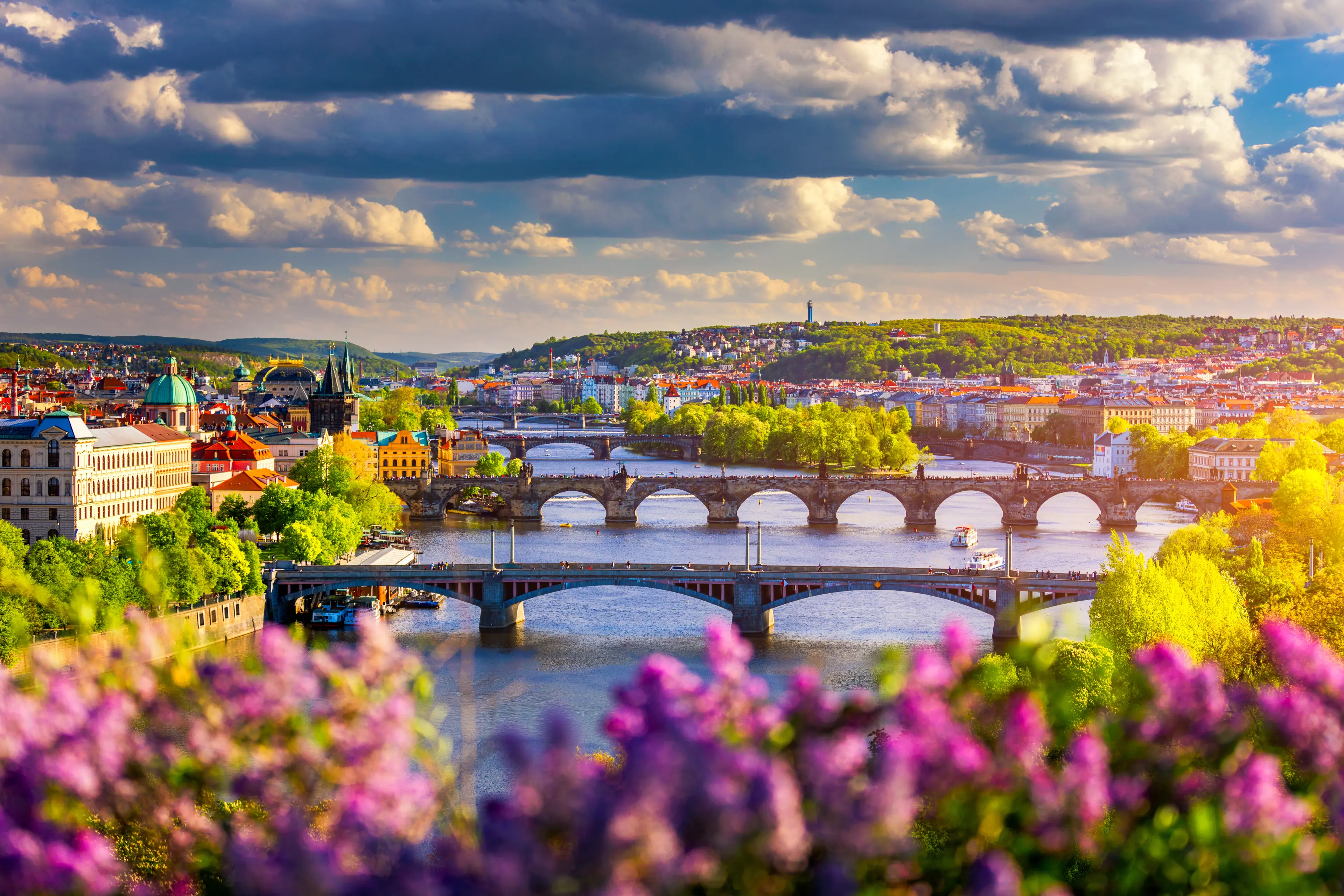 Old Town pier architecture and Charles Bridge over Vltava river