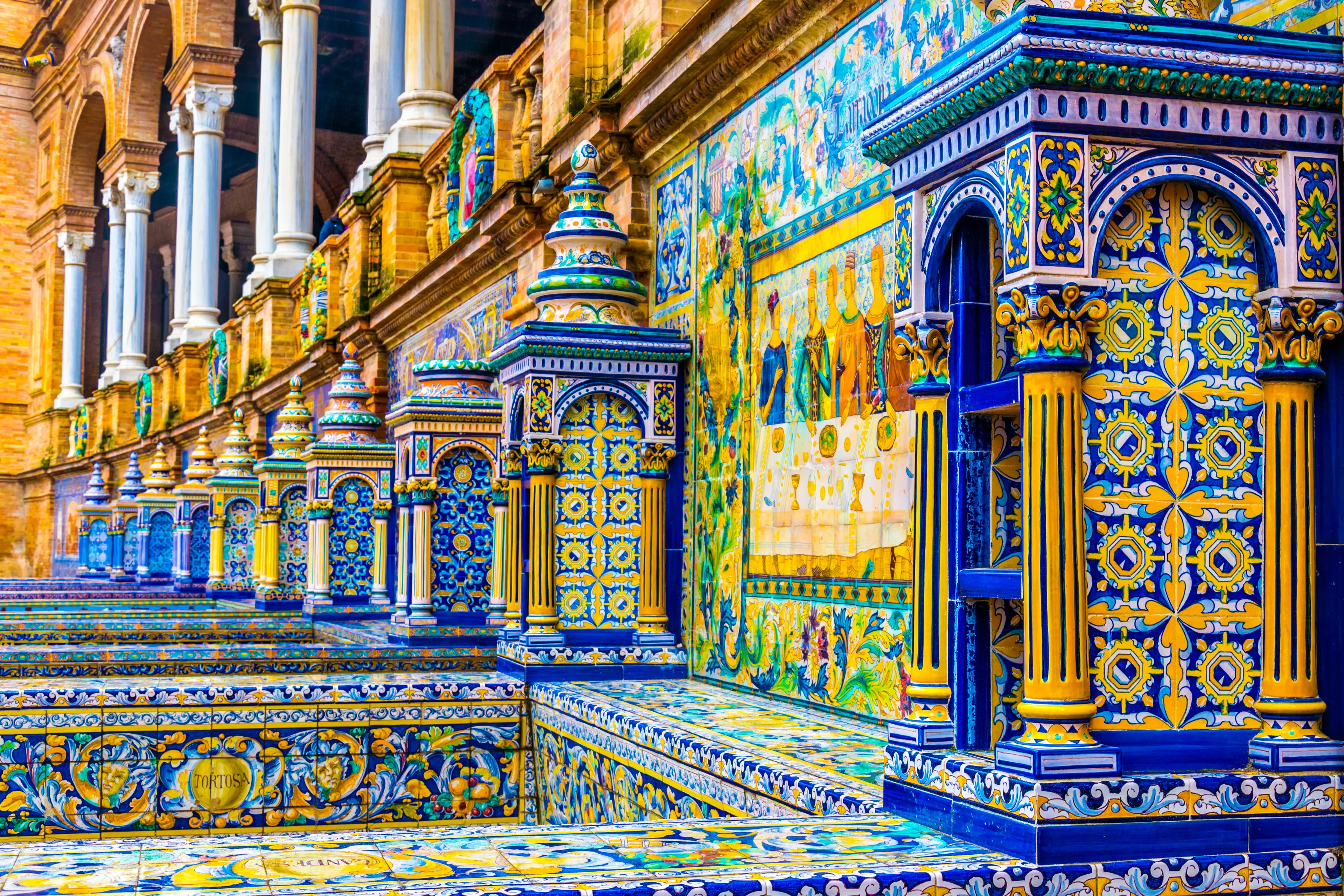 Colorful tiled walls of Plaza de Espana Colorful tiled walls of Plaza de Espana