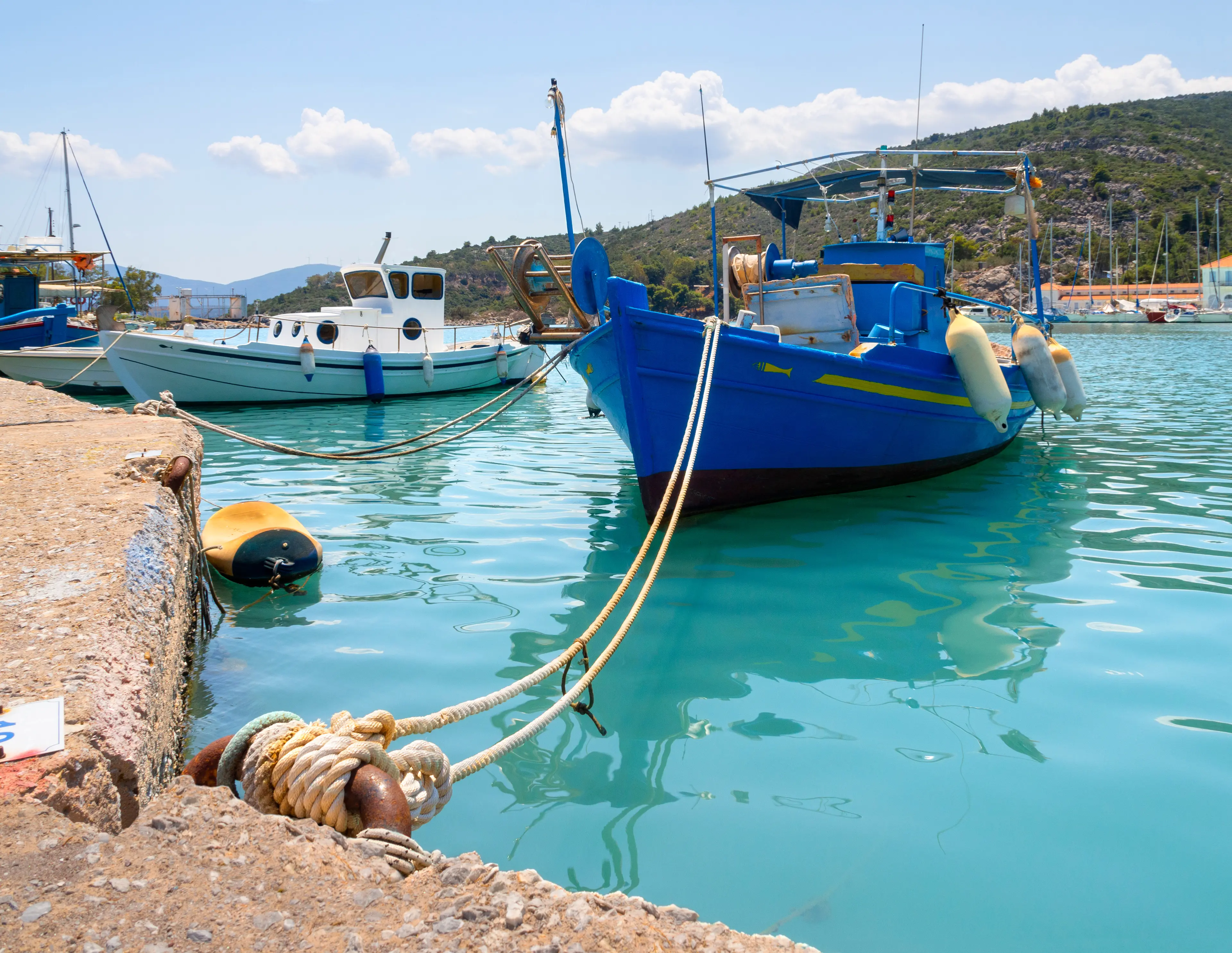 Fishing boats stand in the marina Fishing boats stand in the marina