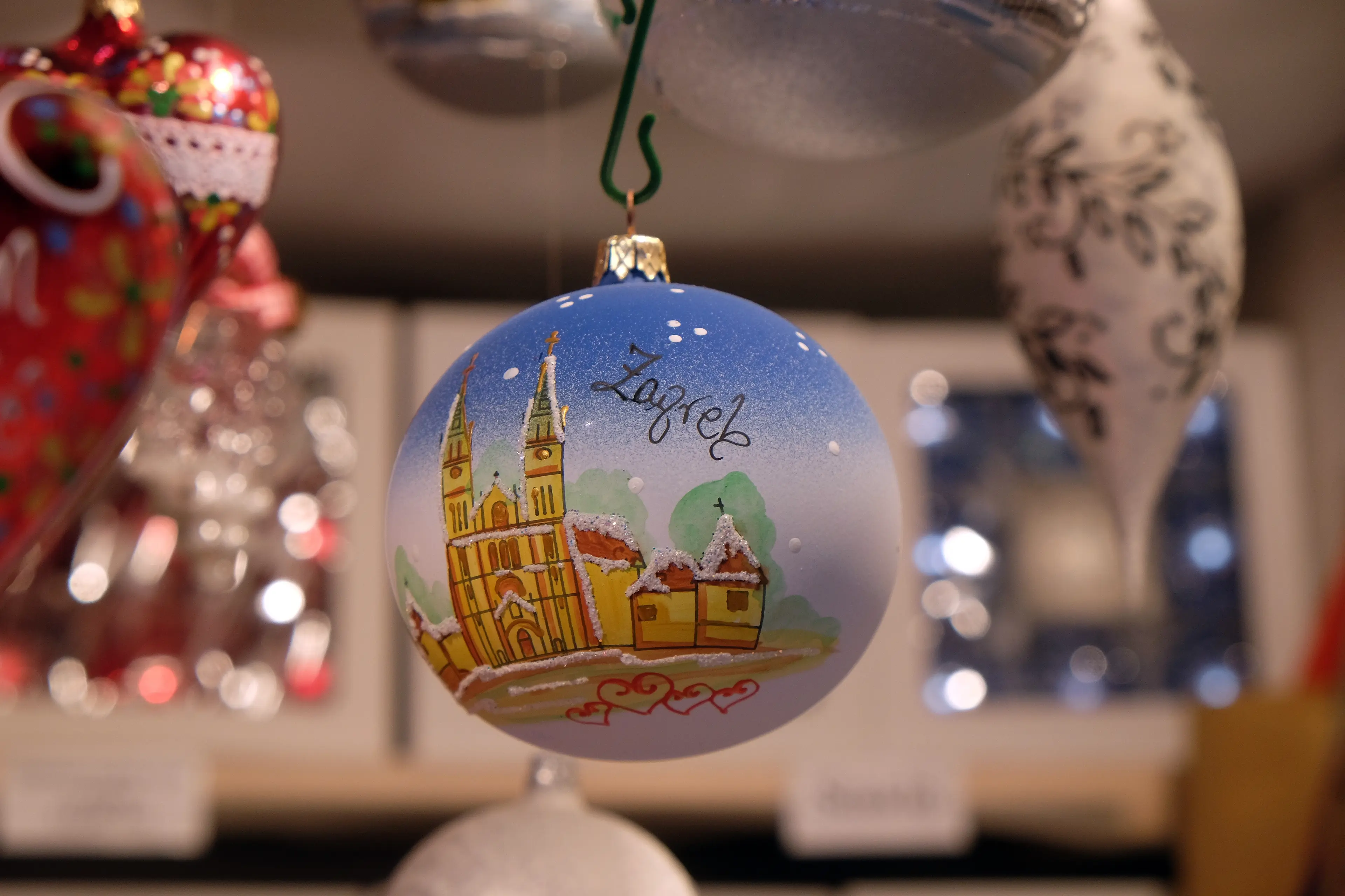 Stall with decorations for winter holidays at traditional annual Christmas market