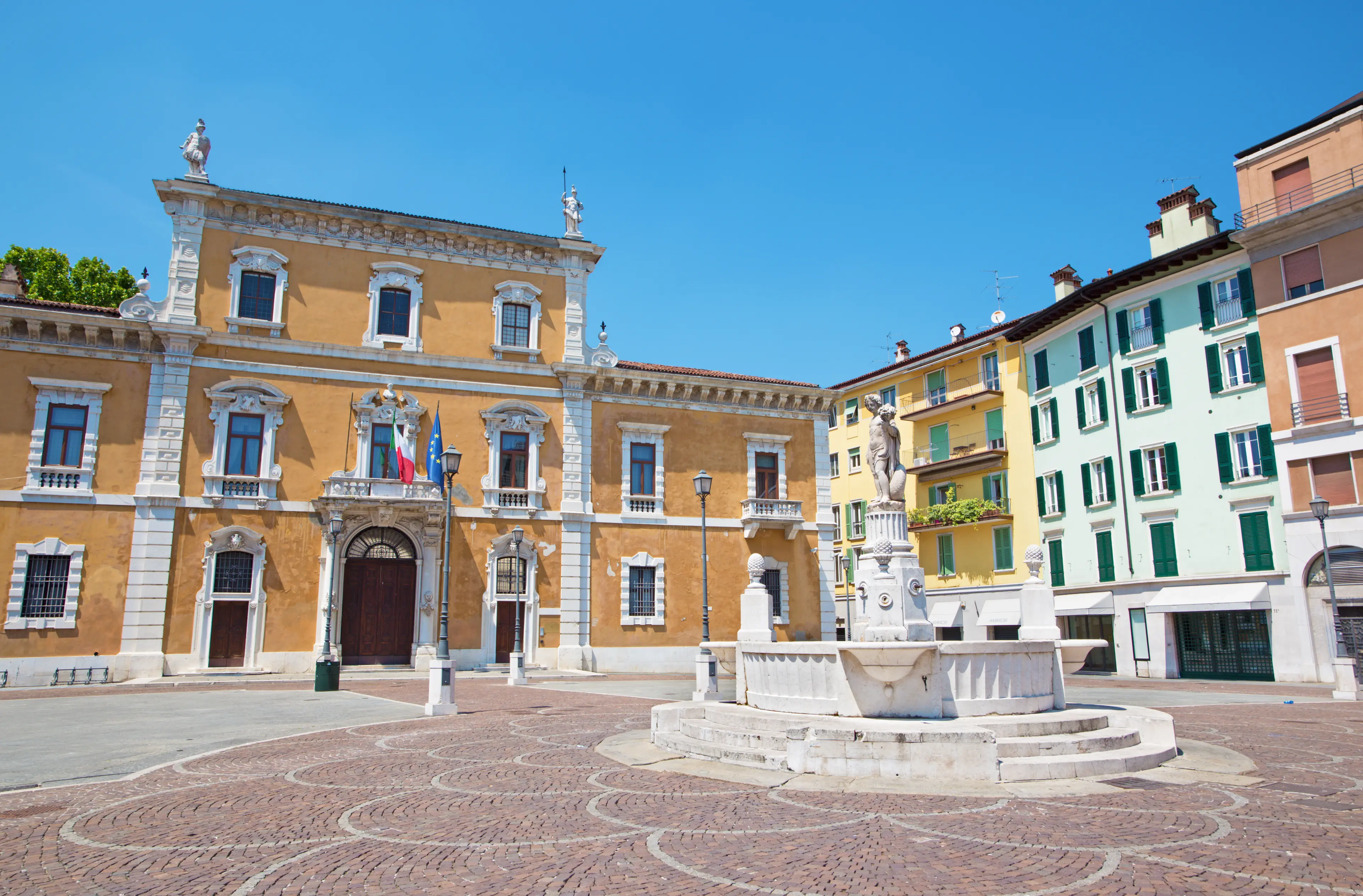 The Piazza del Mercato square and University of Brescia