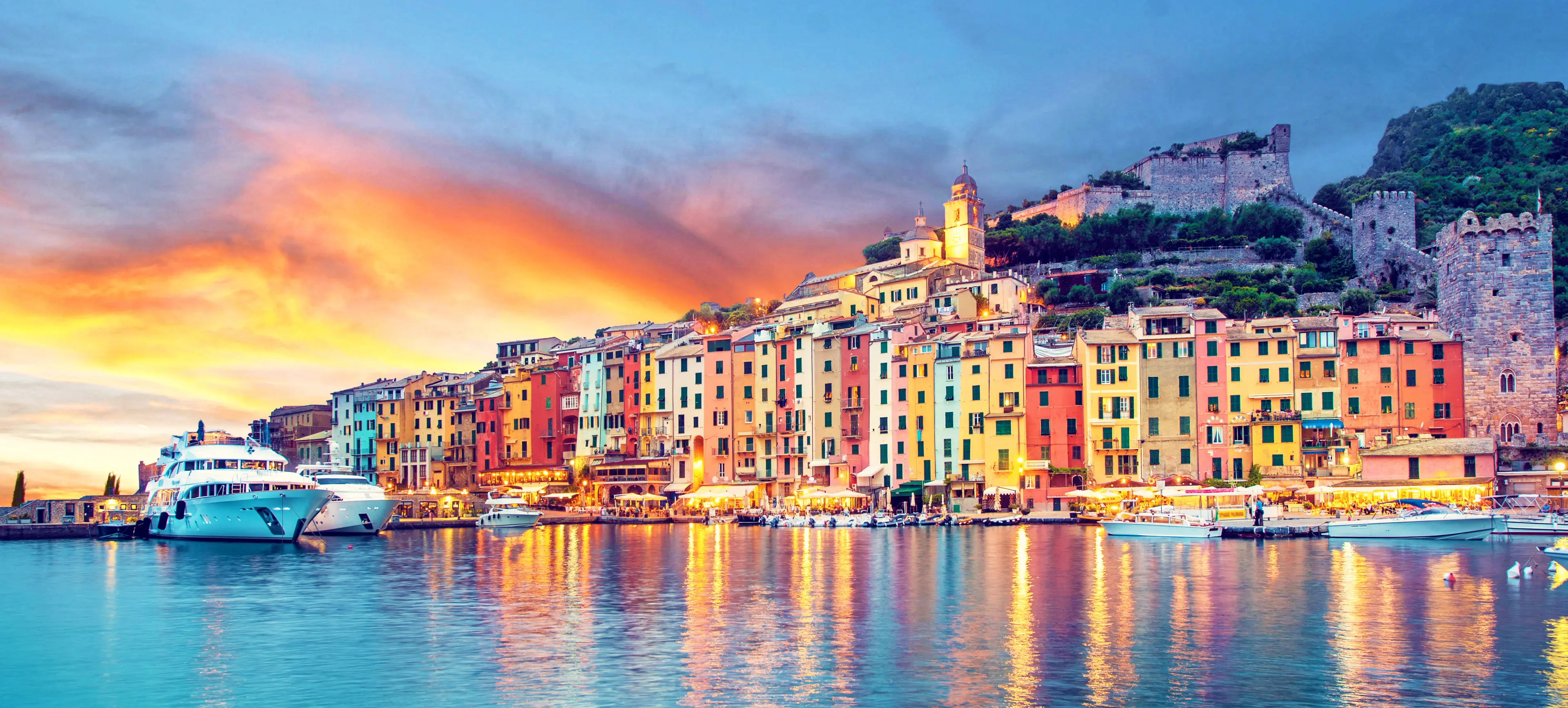 The harbor with colorful houses and the boats in Porto Venero Liguria The harbor with colorful houses and the boats in Porto Venero Liguria