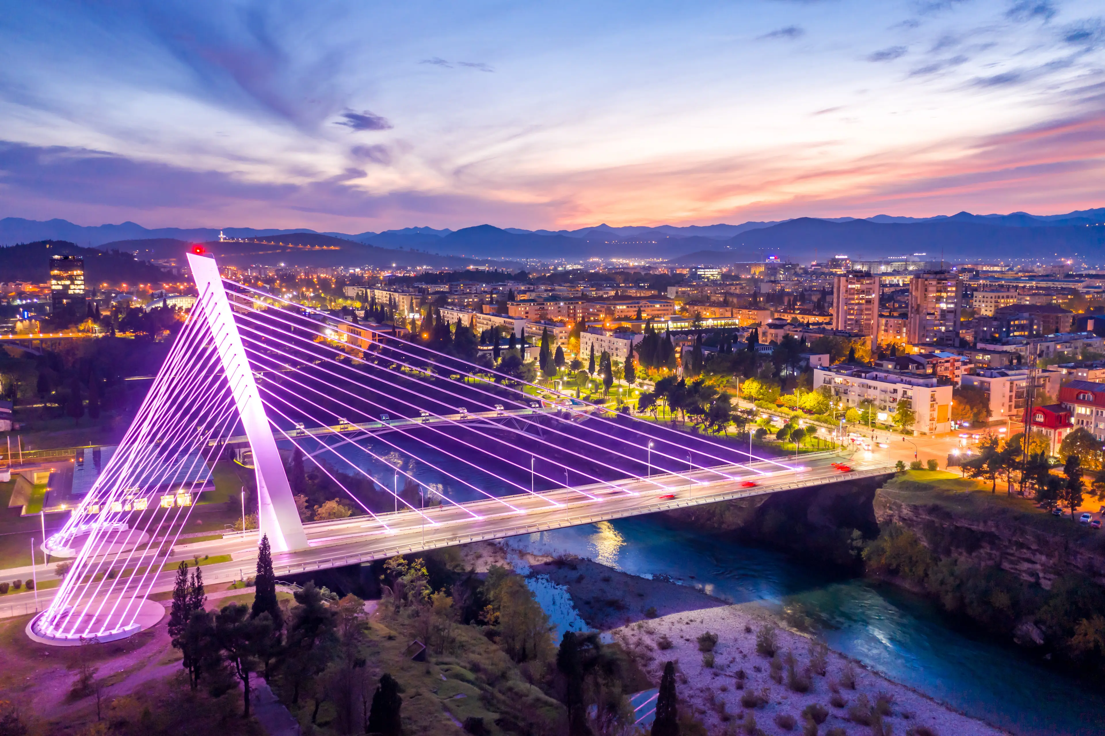 Illuminated Millennium bridge in the city center Illuminated Millennium bridge in the city center