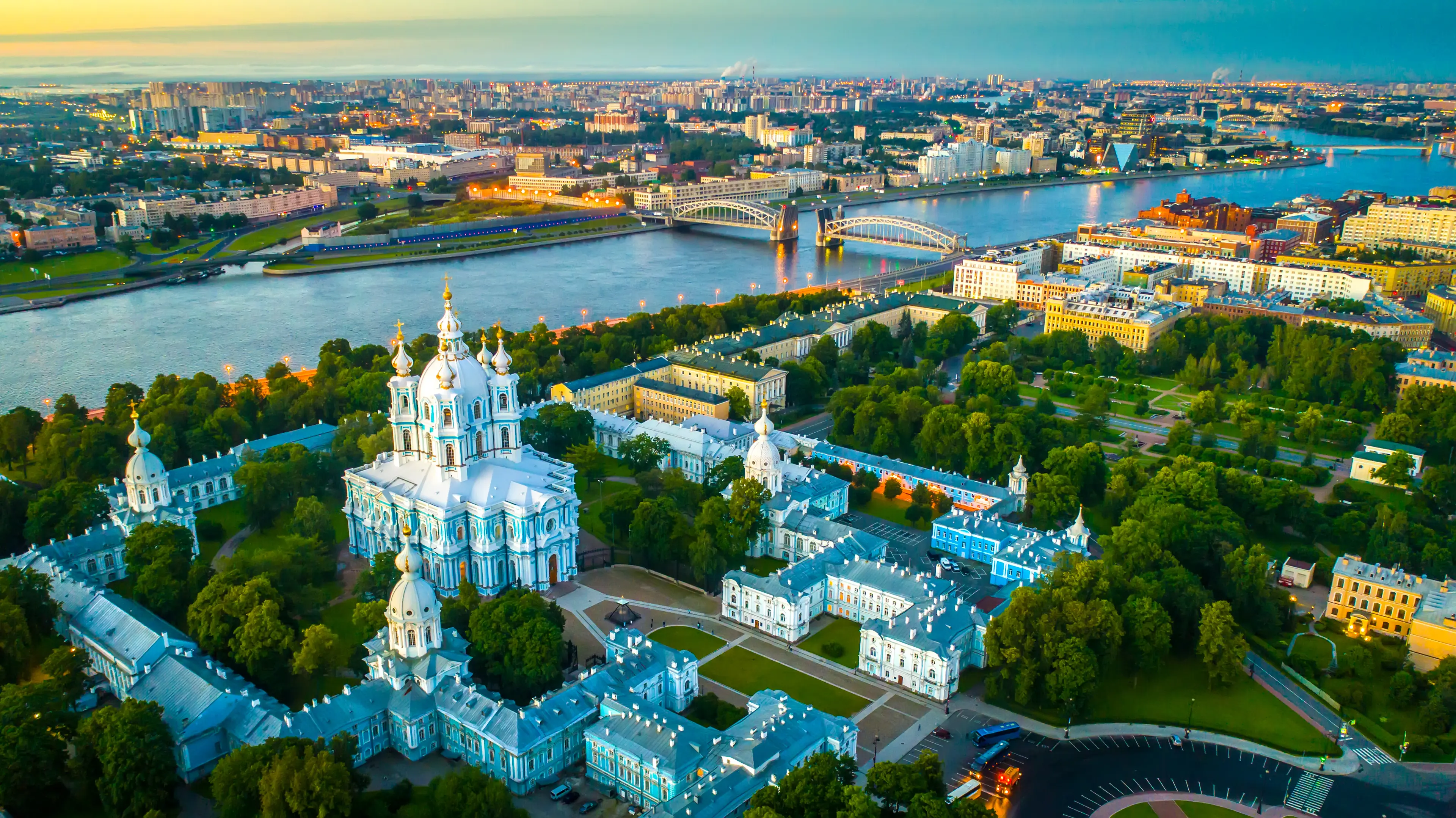 Smolensky temple with a view of Bolsheokhtinsky bridge in the Neva River Smolensky temple with a view of Bolsheokhtinsky bridge in the Neva River
