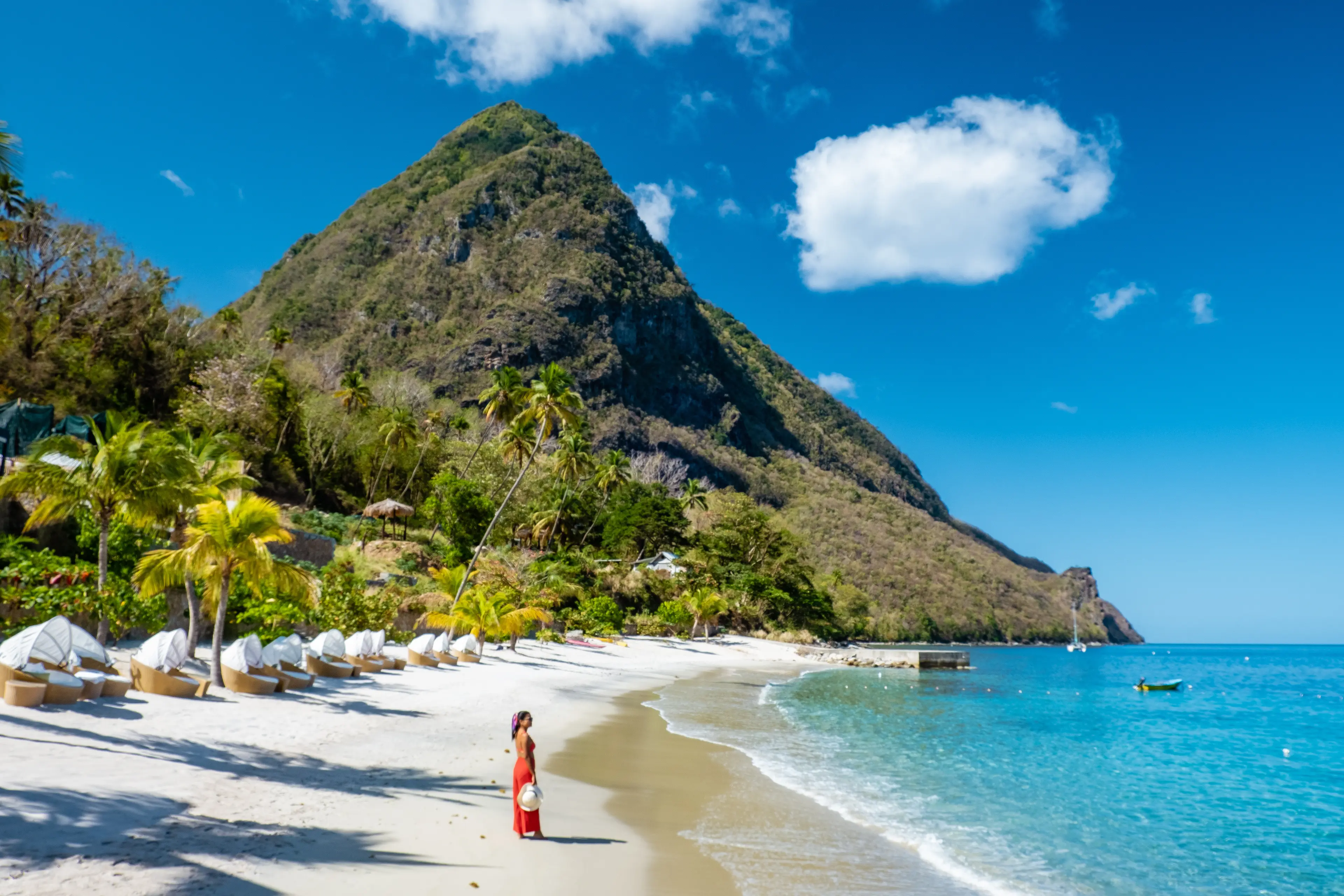 Tourist standing at a tropical beach