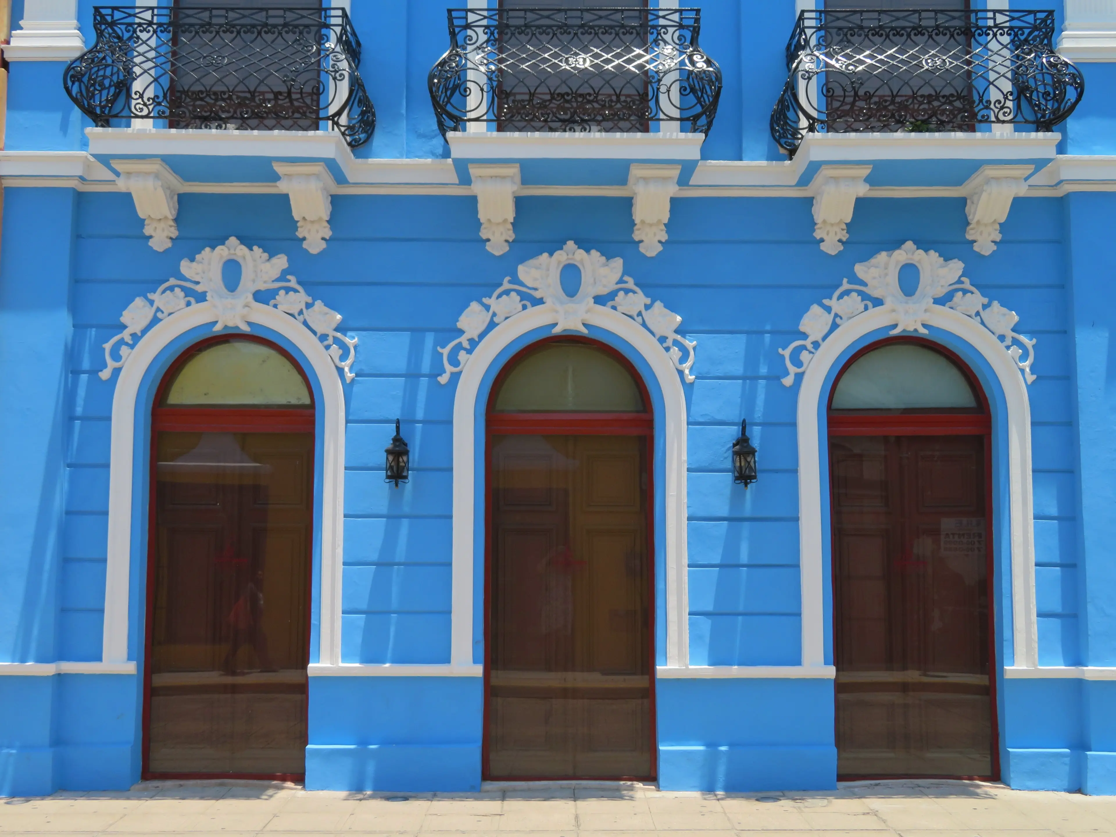 Facade of a blue colonial building