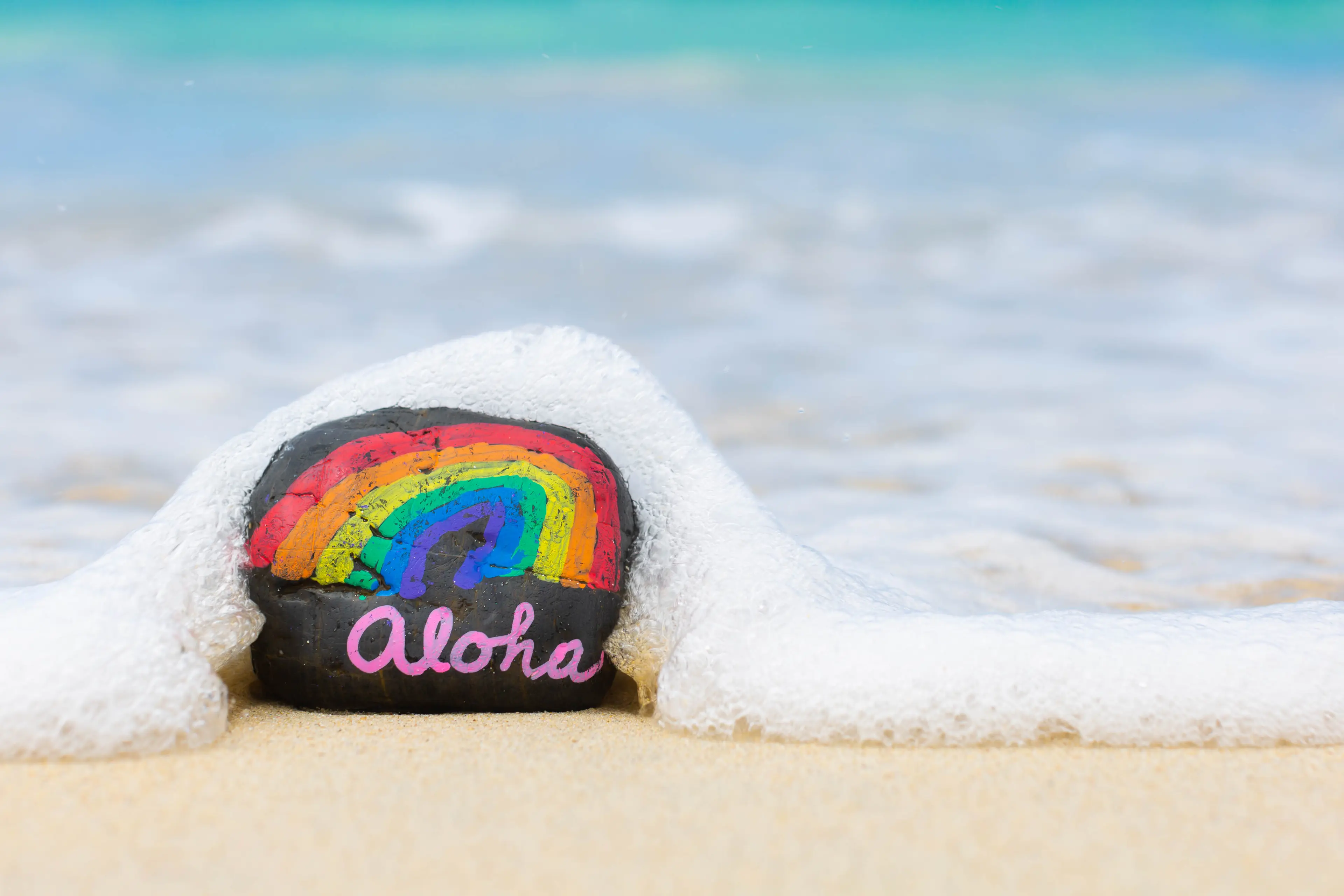 Hawaii beach sand and Hawaiian rainbow.