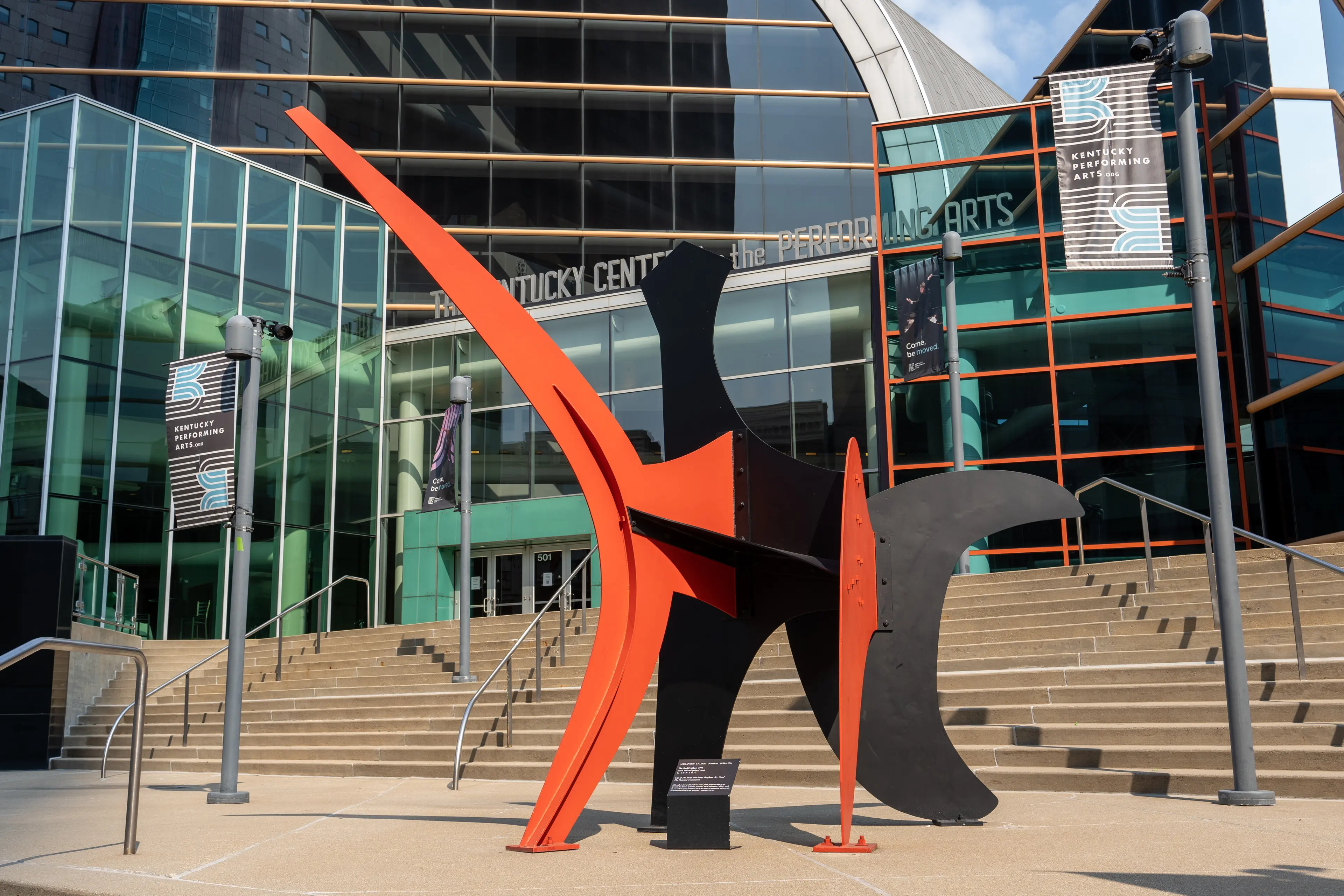 The Red Feather sculpture by Alexander Calder sits in front of The Kentucky Center for the Performing Arts