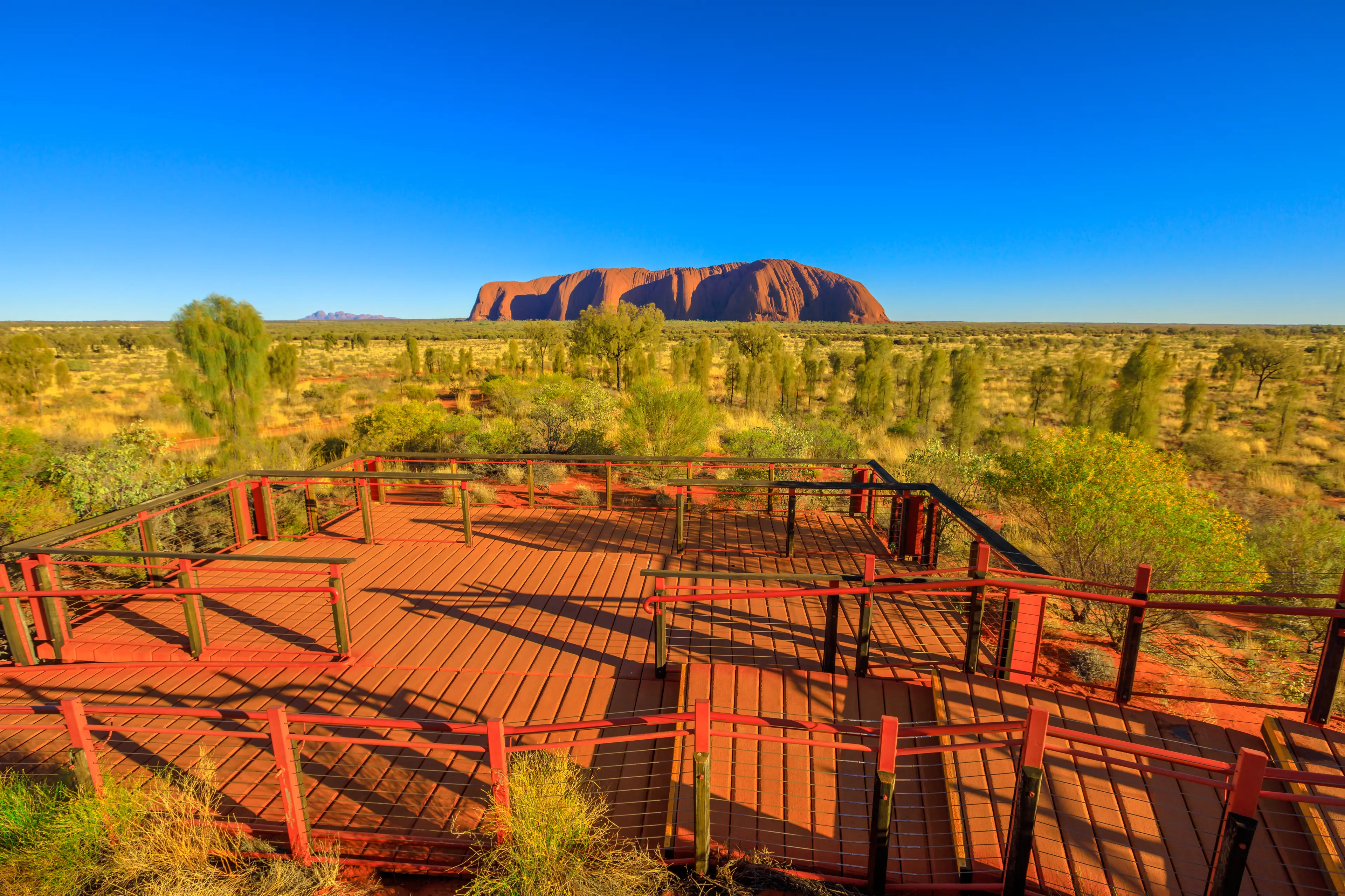 Uluru monolith, the domes of Kata Tjuta and platforms