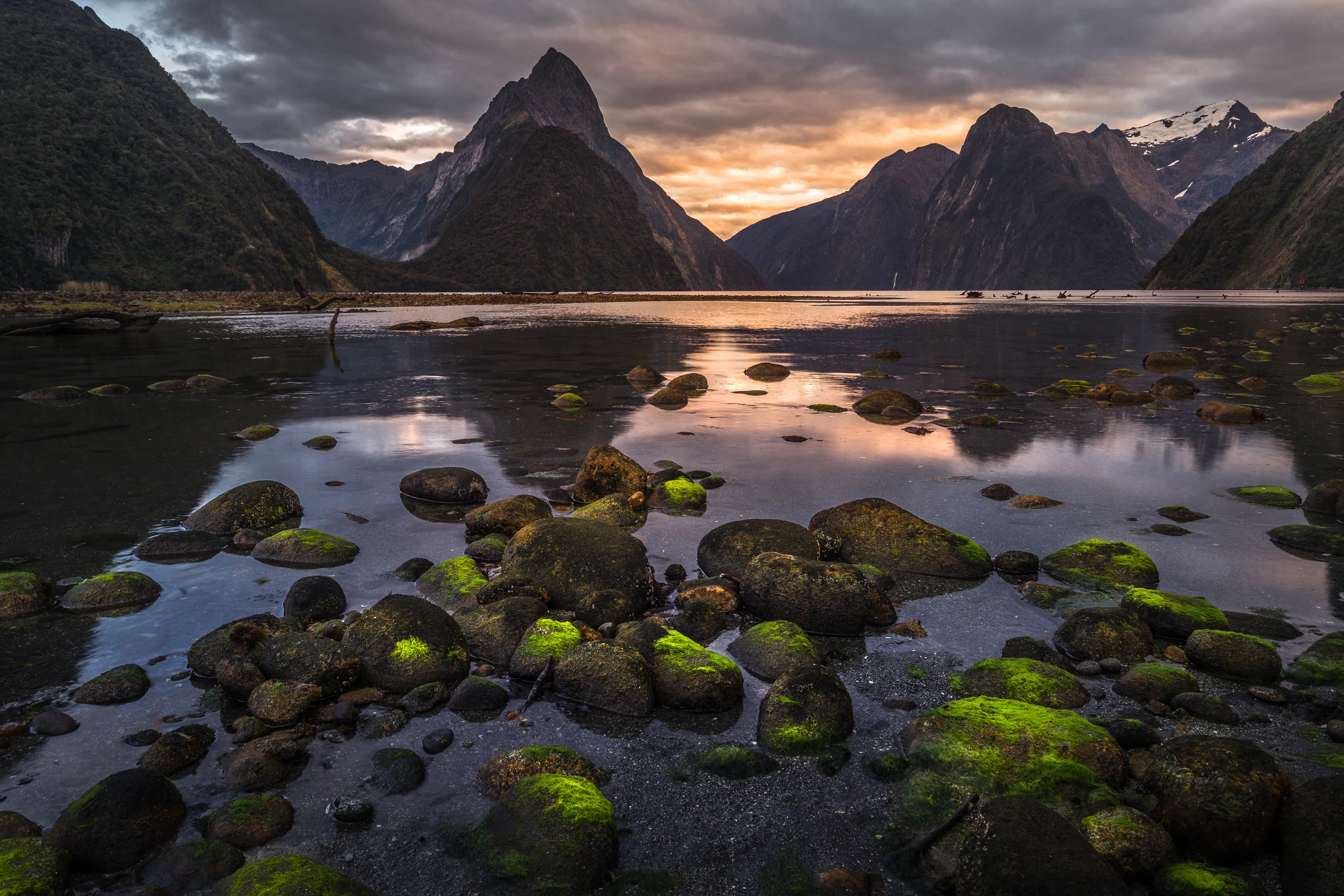 Mossy stones with rocky mountain background Mossy stones with rocky mountain background
