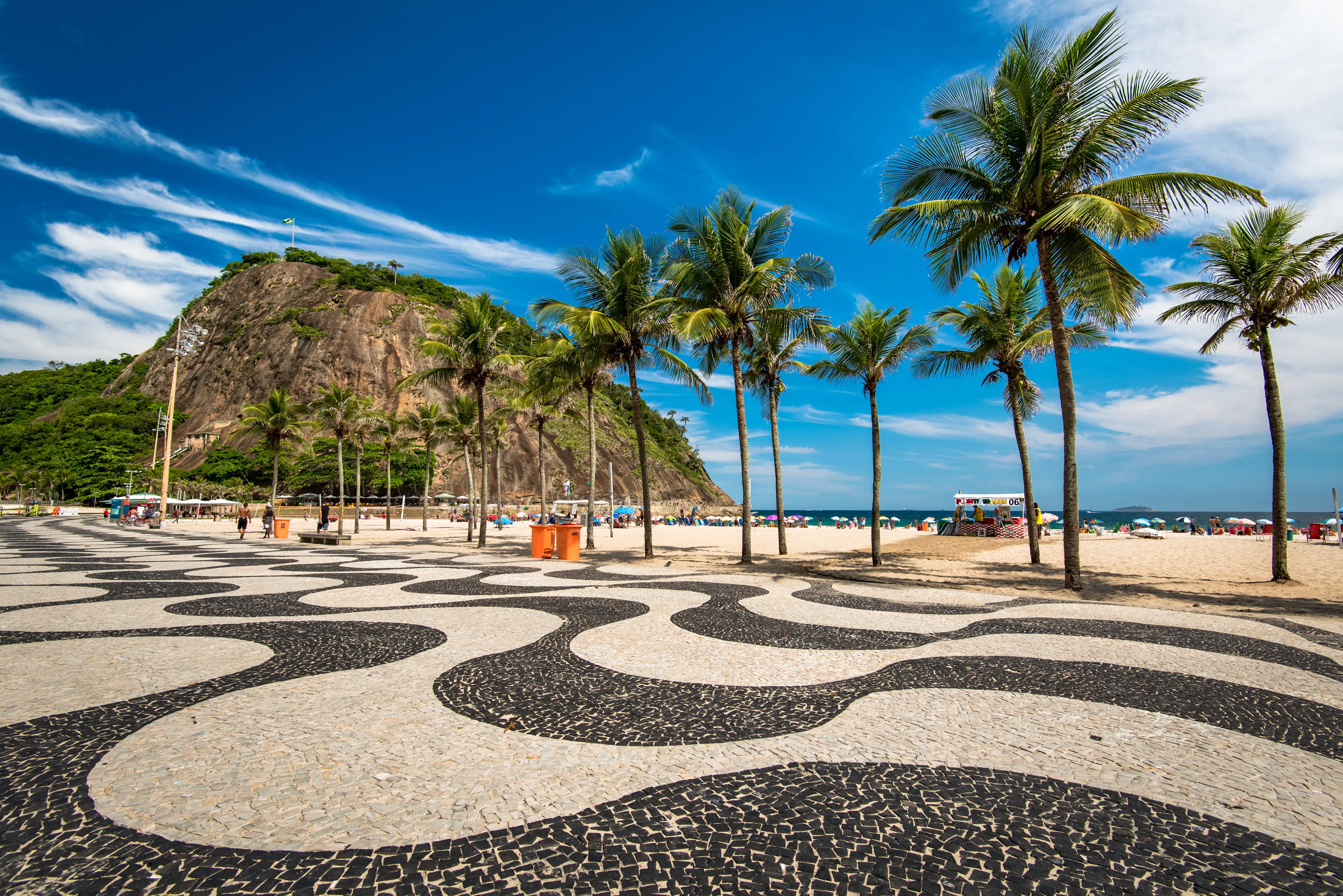 Famous mosaic of sidewalk and palm trees in Leme and Copacabana Beach