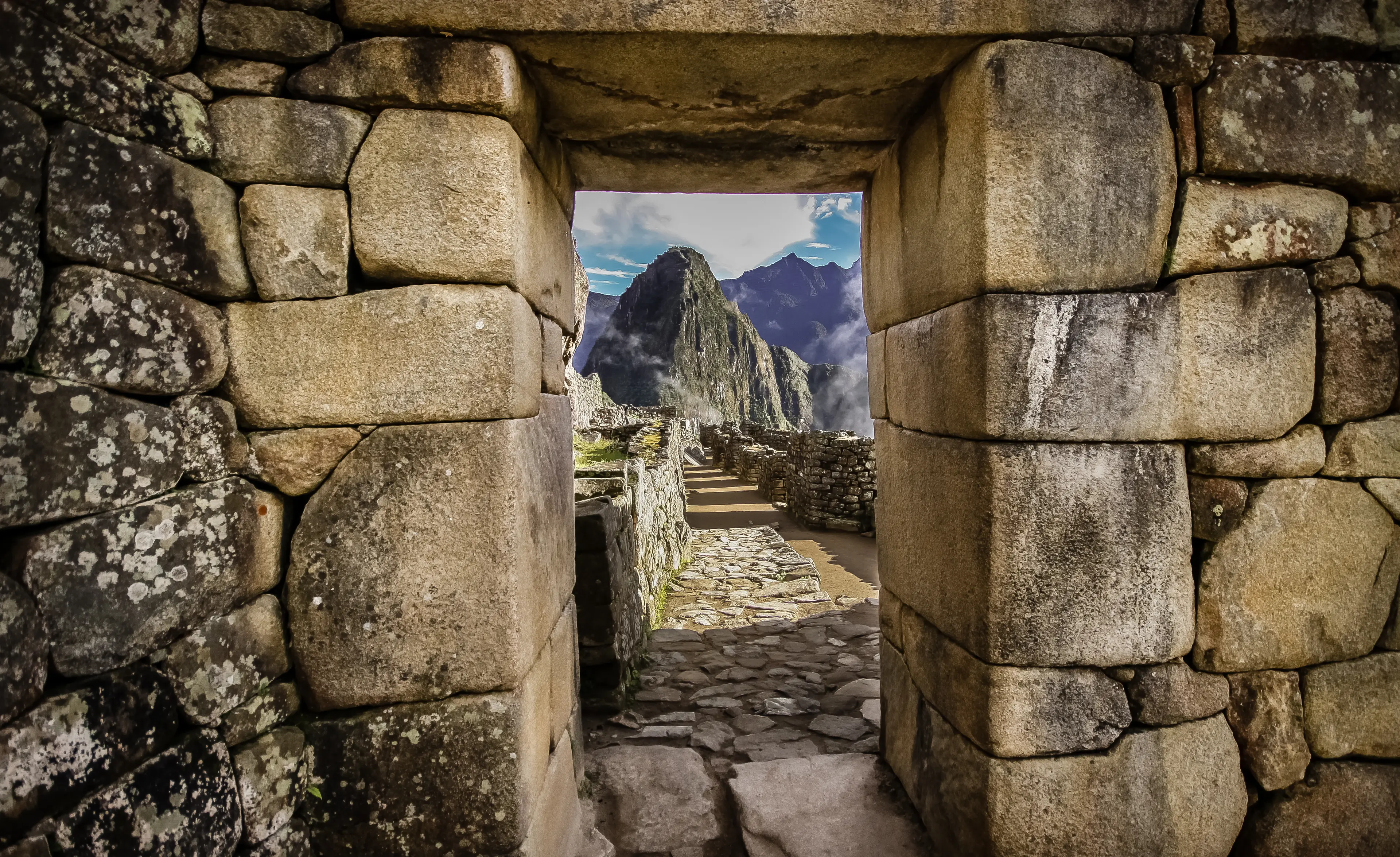 Doorway at Machu Picchu frames a view of Huayna Picchu